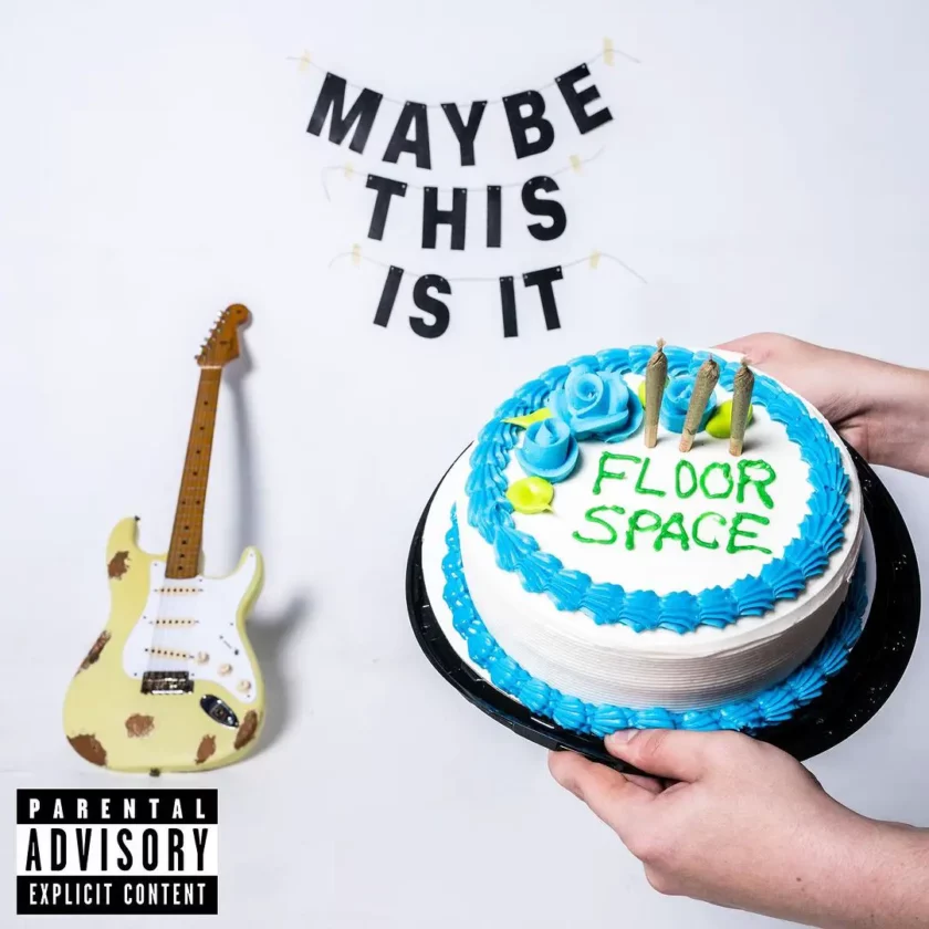 Celebratory cake with guitar and Maybe This Is It banner. Cover art for Floor Space album.