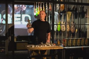 Dan Tremonti, creator of Fret 12 holding String Thing
